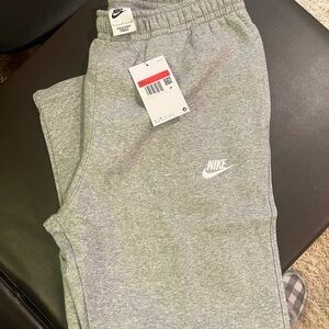 Nike Gray Sweatpants with Elastic Waistband and Fleece Material
